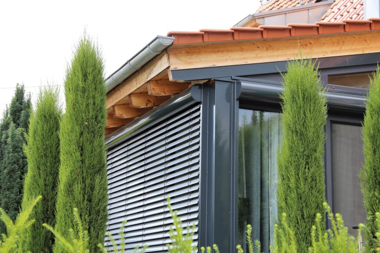 Winter garden with venetian blind, exterior shot